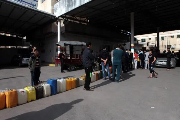 People lining up to get fuel during a shortage in Gaza.