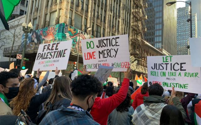 Protest with signs such as "Free Palestine," "Do Justice Love Mercy".